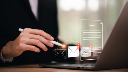 man reading electronic mail ,Email marketing and newsletter concept,Digital communication with email messages,Sending and receiving messages online with the email icon ,notifications