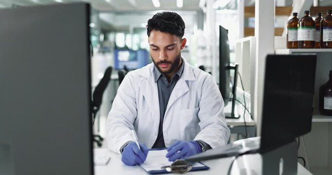 Man, scientist and clipboard in lab with writing, stats and progress in clinical analysis. Person, study and research with notes, medical or admin for vaccine development at pharmaceutical company