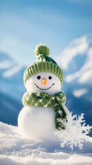 Obraz premium A cheerful snowman stands in a winter landscape, adorned with a green hat and scarf, surrounded by sparkling snow.