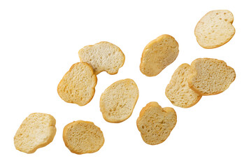 Baguette croutons flying close-up on white. Isolated