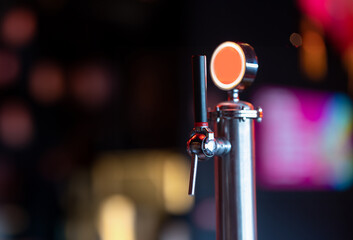 Beer tap standing alone waiting for bartender
