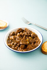 Beef ragout with pickled cucumber