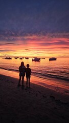 Obraz premium silhouette of children at sunset
