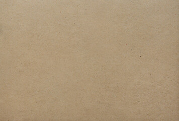 Light brown recycled paper texture background providing copy space
