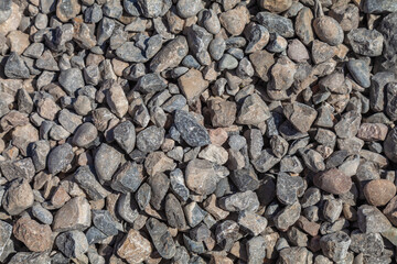 rock or stone background and texture.construction stone rubble on the road