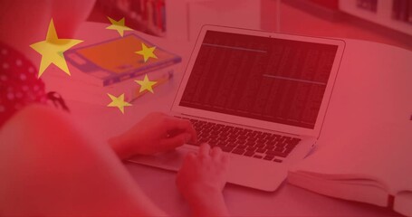 Animation of flag of china over caucasian businesswoman using laptop - Powered by Adobe