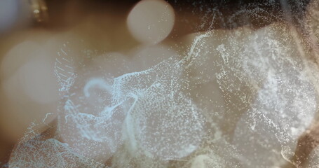 Abstract particles and light streaks image over blurred background