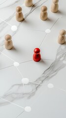 Obraz premium A red wooden figure stands at the core of a network, encircled by white figures against a blue background, illustrating the concept of leadership and collaboration