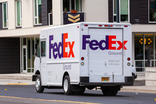 Portland, Oregon/USA-June 19, 2019: Fedex International shipping company's vehicle in delivery process. High quality picture for download