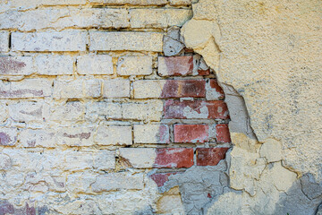 Old destroyed brick wall as background.