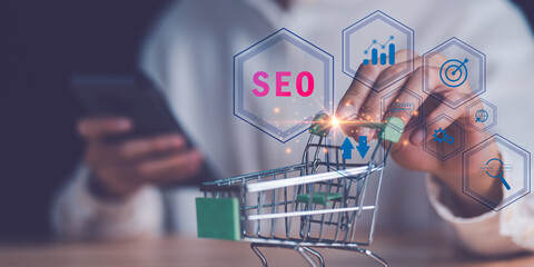 Marketer showing SEO concept ,optimization analysis tools , search engine rankings , social media...