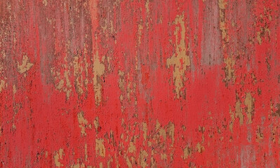 Peeling paint on an old wall. Grunge background for design.Selective focus