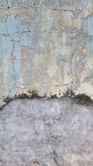 Peeling paint on an old wall. Grunge background for design.Selective focus