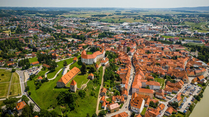 Aerial drone view of Ptuj townscape in Slovenia by river Drava