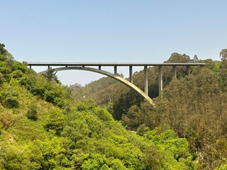Fototapeta premium Viaducto del Pintor Fierros bridge in the mountains near Valdés, Asturias, Spain, June 2023