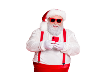Portrait of funny funky fat overweight santa claus with big abdomen belly use cell phone comment newyear posts wearing stylish trendy eyewear eyeglasses hat reading news isolated over red background