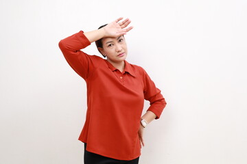 Bothered and tired asian woman, looking complicated, slap forehead, face palm sign and grimacing...