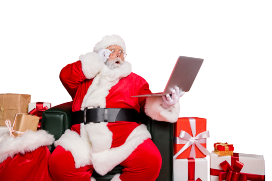 Stunned hard-working fat bearded man St Nicholas sitting on armchair shop delivery checking address list clients web orders fairy dream christmastime isolated on bright vivid shine red background