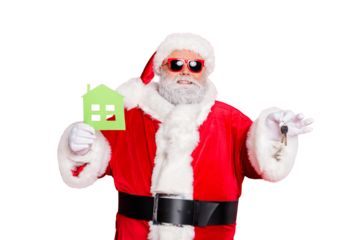 Portrait of cheerful santa claus in eyewear eyeglasses holding keys and paper card building give move house present wearing hat cap belt isolated over reed background