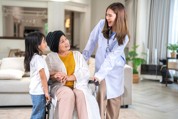 Fototapeta premium Portrait of smiling asian doctor service help support discussing and consulting taking care, caring, caregiver with senior elderly woman with cancer cover head of chemotherapy cancer, cancer day