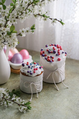 Easter cakes and painted Easter eggs on the table by the window. Easter traditions