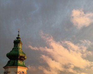 A turret against the backdrop of a cloudy sky. © Damian