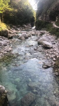 Elevated View Video of Soča River in the Julian Alps with Its Turquoise Water during a Sunny Summer Day. Tolmin Gorge, Julian Alps, Slovenia