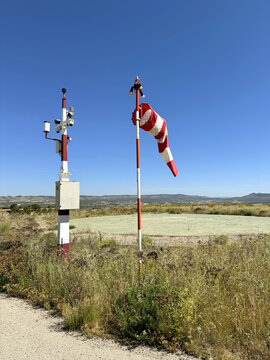 Windsock and equipment at rural emergency heliport