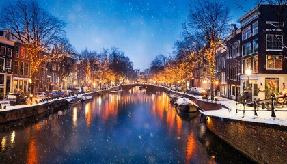 Fototapeta premium A serene view of a snowy canal in Amsterdam at night. 