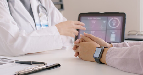 Close-up GP advice AI smart IoT watch guide to patient help collect ECG data, pulse heart rate,...
