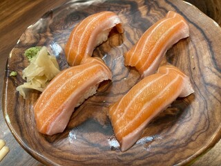 fresh salmon sushi on plate