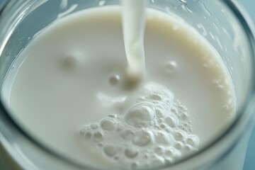 Pouring Creamy Milk from Jar Up Close