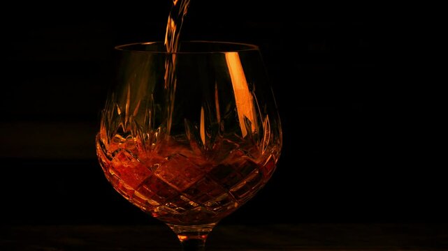 Glass Of Whiskey Poured By Fire
