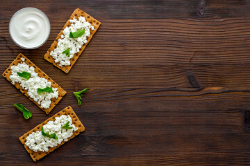 Healthy protein breakfast with crispy toasts and farm cottage cheese