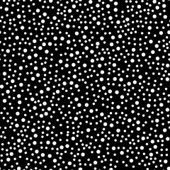 White dots on black background