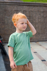 portrait of a child with red hair