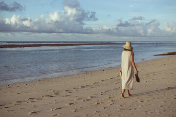 women walking on the beach 