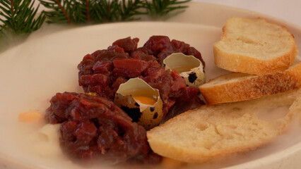 Venison Tartare and Quail Eggs. Fine Dining Delicacies, Close-Up