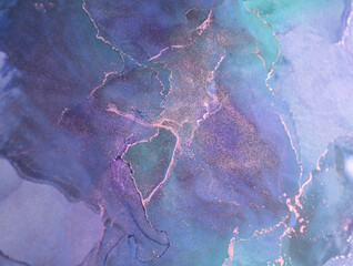 Fluid abstract art featuring vibrant purple and teal hues with shimmering gold accents, showcasing unique patterns and textures