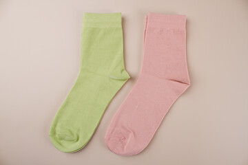 Colored socks on a beige background