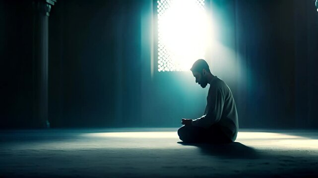 Silhouette of Muslim man having worship and praying for fasting and Eid of Islam culture in old mosque with lighting and smoke background . Islam in mosque 4k video