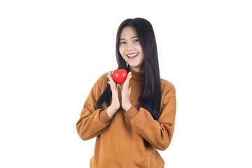 Young Asian woman holding red heart isolated on white background with clipping path. Health...