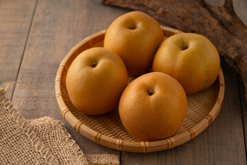 Japanese pears,Asian pears.
Asian pears: any of a variety of pears, mainly of Japanese and Chinese origin, with crisp, juicy flesh and typically have yellow, brown, or green skin.
