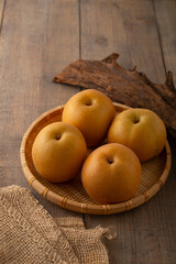 Japanese pears,Asian pears.
Asian pears: any of a variety of pears, mainly of Japanese and Chinese origin, with crisp, juicy flesh and typically have yellow, brown, or green skin.
