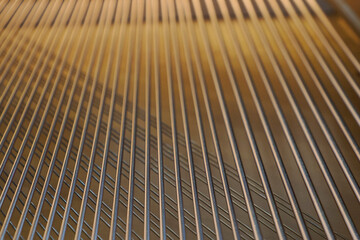 acoustic grand piano strings detail close up