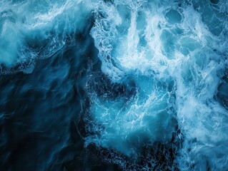 aerial view of majestic blue ocean waves their intricate patterns and foam creating a mesmerizing natural abstract deep azure hues dominate the seascape
