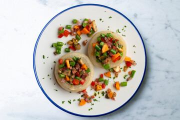 Baked onions stuffed with healthy vegetables. Top view table.