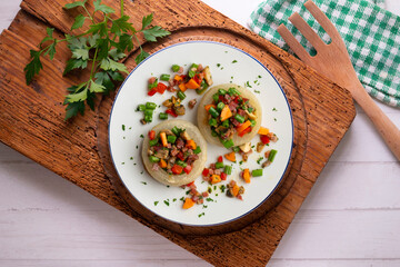 Baked onions stuffed with healthy vegetables. Top view table.