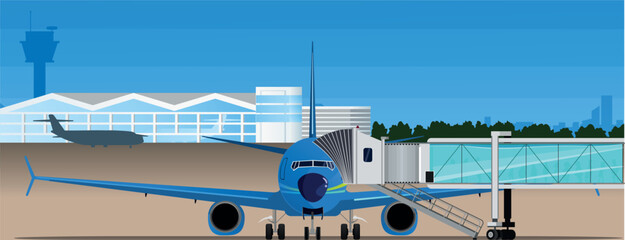 passenger boarding bridge docked to the airplane. passengers are boarding.