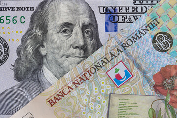 100 dollar banknote and 200 Romanian Lei banknotes